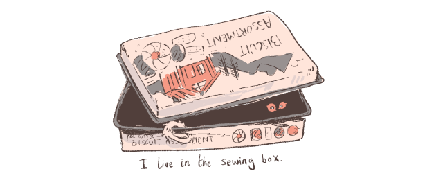 tiny red eyes look out from inside a biscuit tin. text underneath reads: I live in the sewing box.